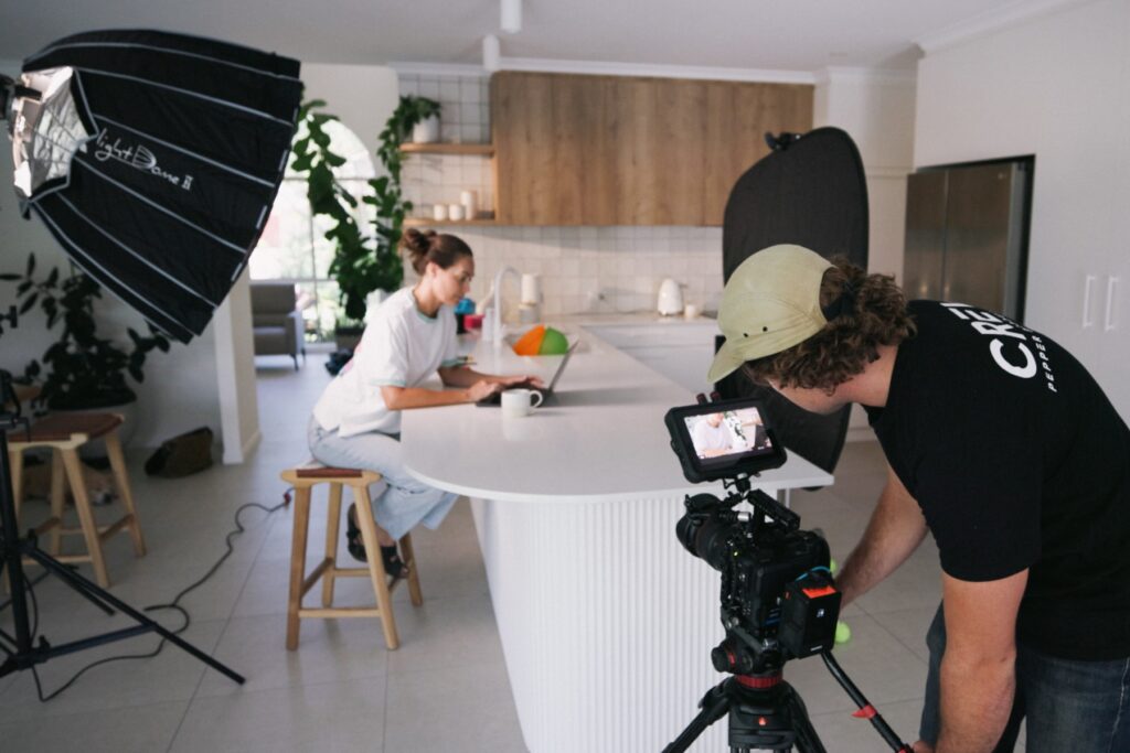 Pepper filming an interview on location